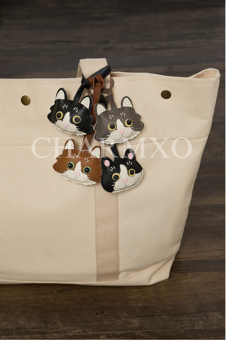 BLACK AND WHITE CAT BAG CHARM