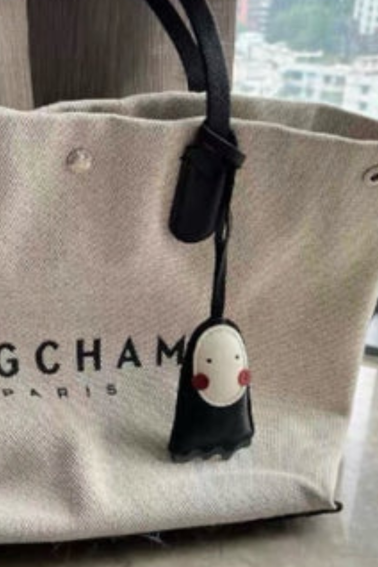 NO FACE BAG CHARM