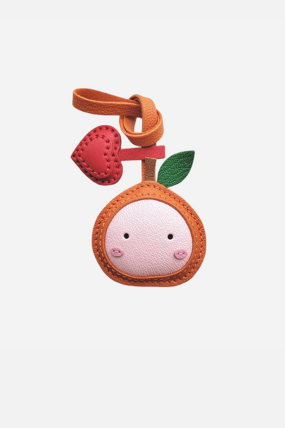 ORANGE BAG CHARM